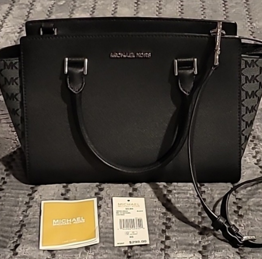 Michael Kors Black pocketbook with handles and shoulder strap